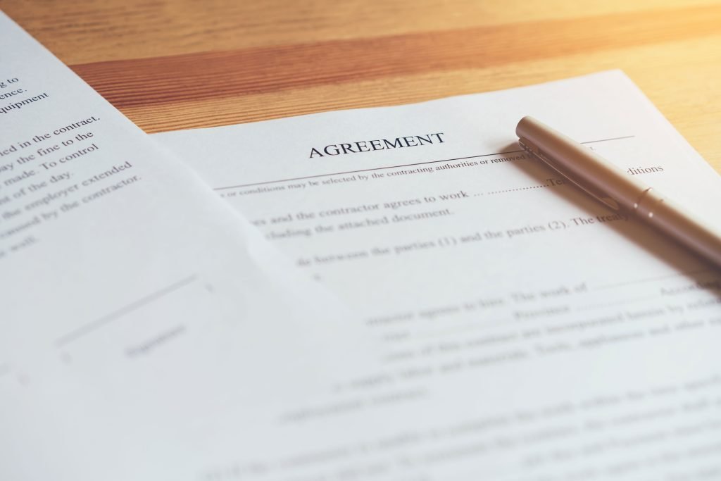 closeup-of-signing-a-documentation-agreement-and-p-2022-11-10-08-17-55-utc